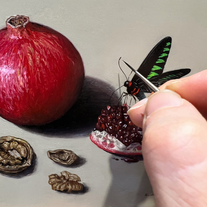 pomegranate walnuts and butterfly still life oil painting by Rebecca Luncan in progress